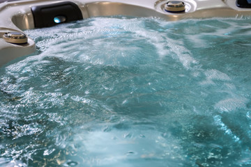 water boils and massages in the Jacuzzi bath - obrazy, fototapety, plakaty