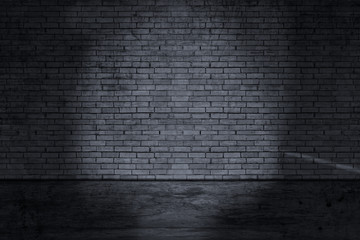 Texture dark concentrate floor with brick wall 