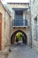 Fototapeta na wymiar Old stone street in a Cypriot village.