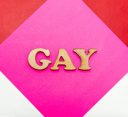 A Gay symbol created with wooden lettering.
