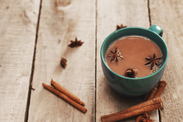 masala chai with spices. Cinnamon Stick, Thai Cardamom, Ginger, Clove, Star Anise, Black Peppercorns, Fennel Seeds, Black Tea