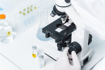 Professional international medical worker using modern equipment