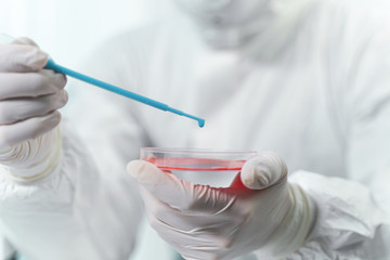 Competent researcher doing blood expertise in the lab