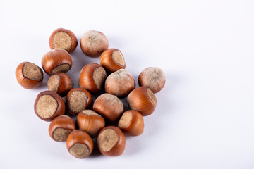 Nuts isolated on white background on the left side