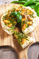 Pie with salmon, ramson and soft cheese