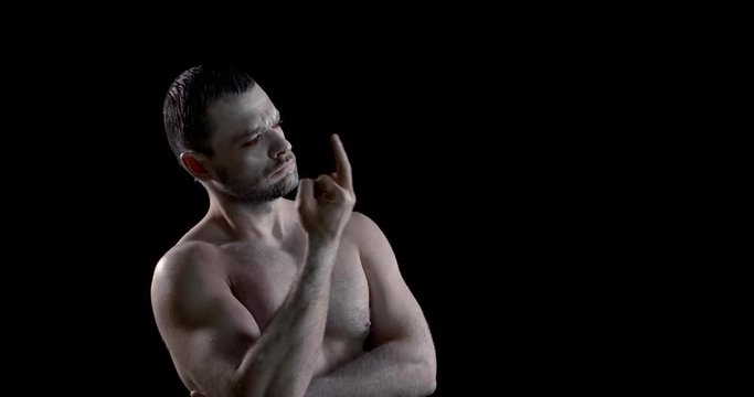 crazy man with split personality is communicating with himself in dark room, gesticulating emotionally