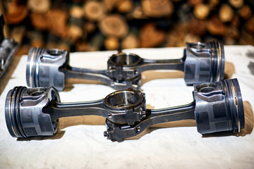 Automotive four-cylinder engine water cooling during repair.