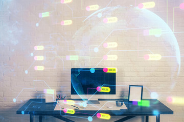 Double exposure of desktop computer and technology theme hologram. Concept of software development.