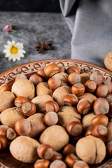 Nuts and walnuts in a pottery bowl