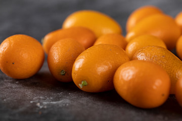 Fresh kinkans on a piece of marble with shadow underneath