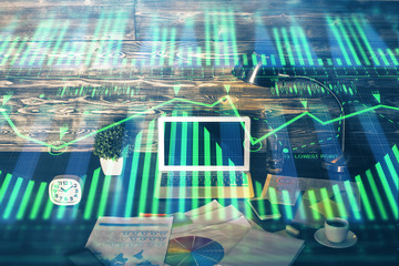 Double exposure of laptop computer and technology theme hologram. Concept of freelance work.