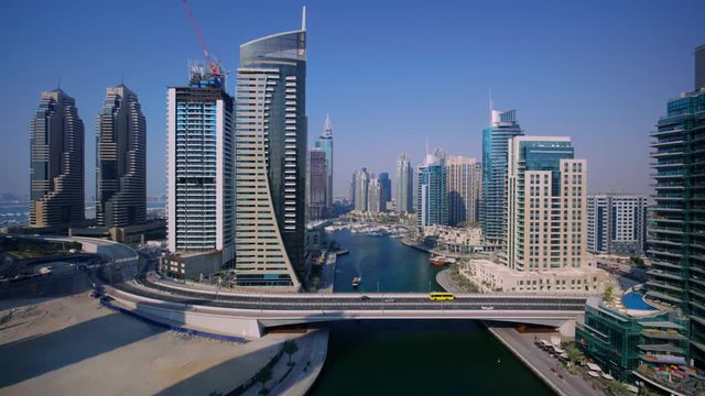 Popular famous modern skyscraper architecture of Dubai downtown cityscape in gorgeous 4k aerial drone panorama flyover