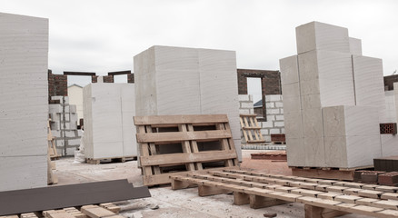 Bricks on a house under construction.