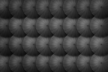 Black umbrella pattern arrangement. Top view creative umbrella background. Nobody. Classic brolly wallpaper