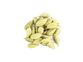 A bunch of green cardamom seeds isolated on white background. Indian cuisine, ayurveda, naturopathy concept