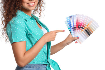 African-American woman with color palettes on white background