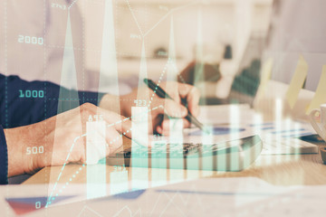 Financial trading graph multi exposure with man desktop background.