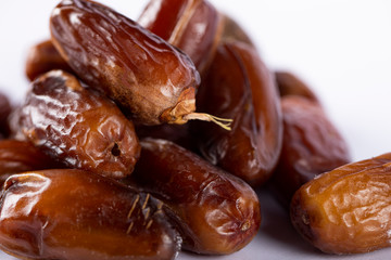 Oriental dates isolated on white. close view