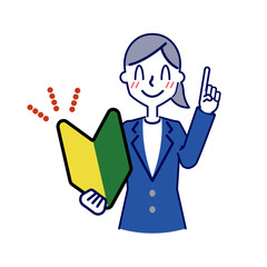 若葉マークを持ってポイントを指摘するビジネスウーマンの上半身