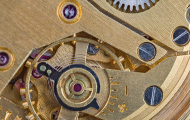 steel and brass clockwork closeup