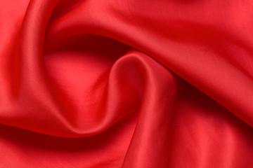 expensive fabric texture. abstract background with soft waves. Smooth elegant red silk or satin luxury cloth