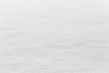 Texture of natural snow. Top view of the snow.