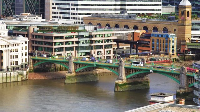 High angle view of traffic cars on Southwark Bridge, London, UK.