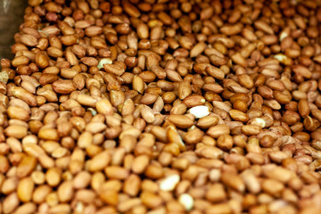 Nuts peanuts unpeeled in a box