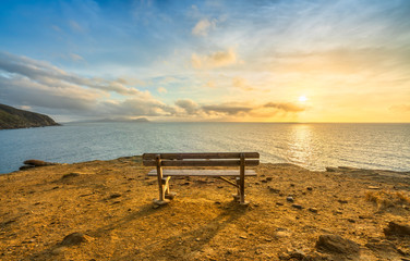 Bench in Populonia cliff Buca delle Fate. Piombino, Maremma Tuscany, Italy.