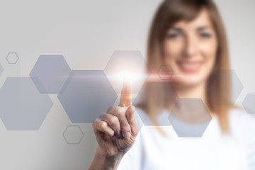 young girl points a finger at the virtual screen, icons are added on a light background. Banner....