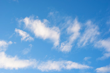 Beautiful blue sky and white fluffy clouds, Vibrant color sky with cloud on a sunny day, The morning sky with clouds in various shapes, Beautiful natural cirrus cloud background.