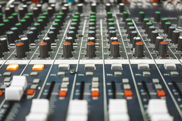 Close-up of professional concert mixing console, equipment for sound mixer control