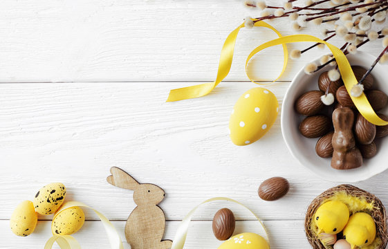 easter eggs on wooden background, copy space for text