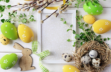 greeting card with colorful easter eggs and spring flowers. mock up frame with copy space