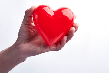 With a red loving hand