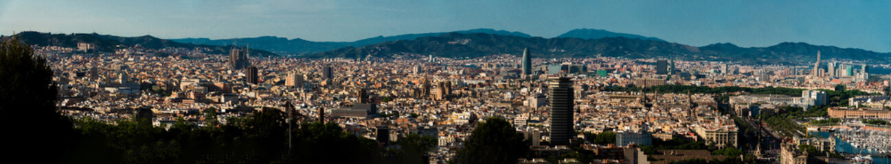 Fototapeta na wymiar Panoramic view of Barcelona city, port and mountains. Spain