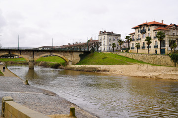 Mont-de-Marsan medieval bridge river and street old ramparts in landes france