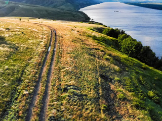 Fototapeta na wymiar Two people in steppe and upper river Don in Russia in summer