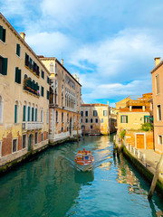 grand canalwith gondola in venice