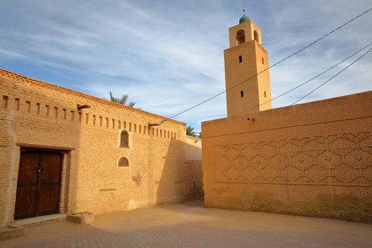 The historical medina of Tozeur (Ouled el Hadef), Tunisia, decorated with patterns of bricks and a minaret