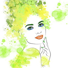 Abstract portrait of a beautiful girl stylized with a painted face and watercolor strokes and splashes on a light background in digital 