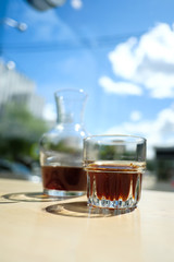 Stylish served specialty alternative black coffee. Filter pour-over coffee served in crystal glass and decanter. Aesthetics coffee