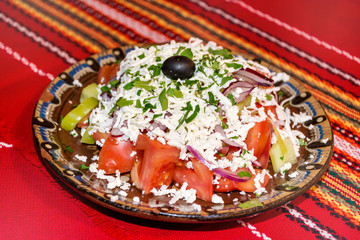 Traditional Bulgarian Salad Called Shopska with  Tomato,Cucumber and Cheese 