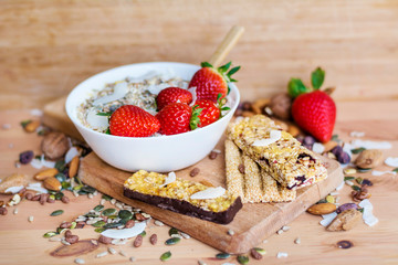 Healthy Breakfast with Muesli with Strawberries and Granola Bars