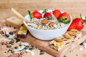 Healthy Breakfast with Muesli with Strawberries and Granola Bars