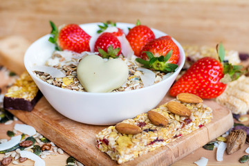 Healthy Breakfast with Muesli with Strawberries and Granola Bars