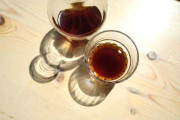 Stylish served specialty alternative black coffee. Filter pour-over coffee served in crystal glass and decanter. Aesthetics coffee