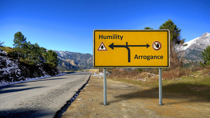 Street Sign to Humility versus Arrogance