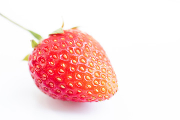 Red strawberry on white background.