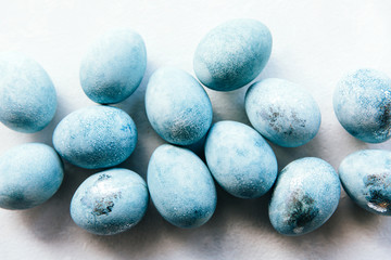 Group ombre blue Easter eggs isolated on white background. Dyed Easter eggs.Compositions in pastel colors. Easter consept. Flat lay, top view. Copy space.